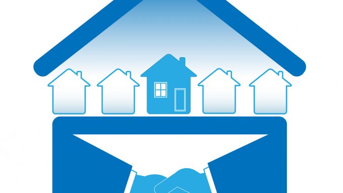 blue sign with handshake and many houses